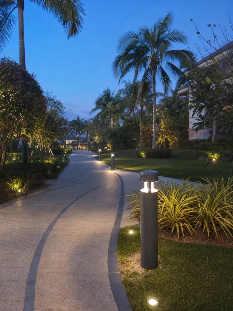 Solar garden and landscape lighting illuminating a resort pathway with decorative bollards and ground fixtures