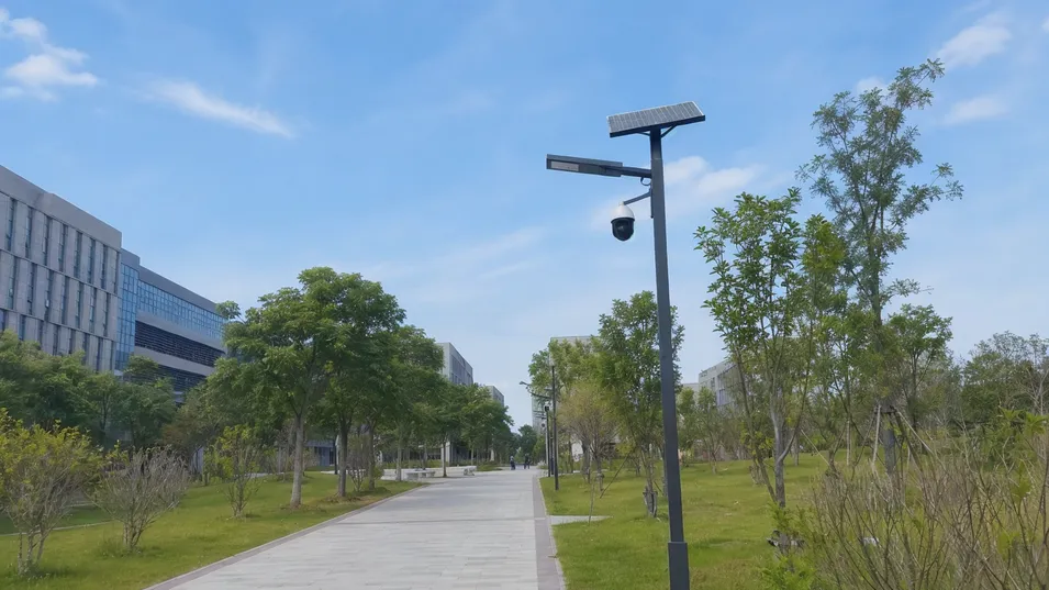 Solar street light with camera installed on a university campus pathway