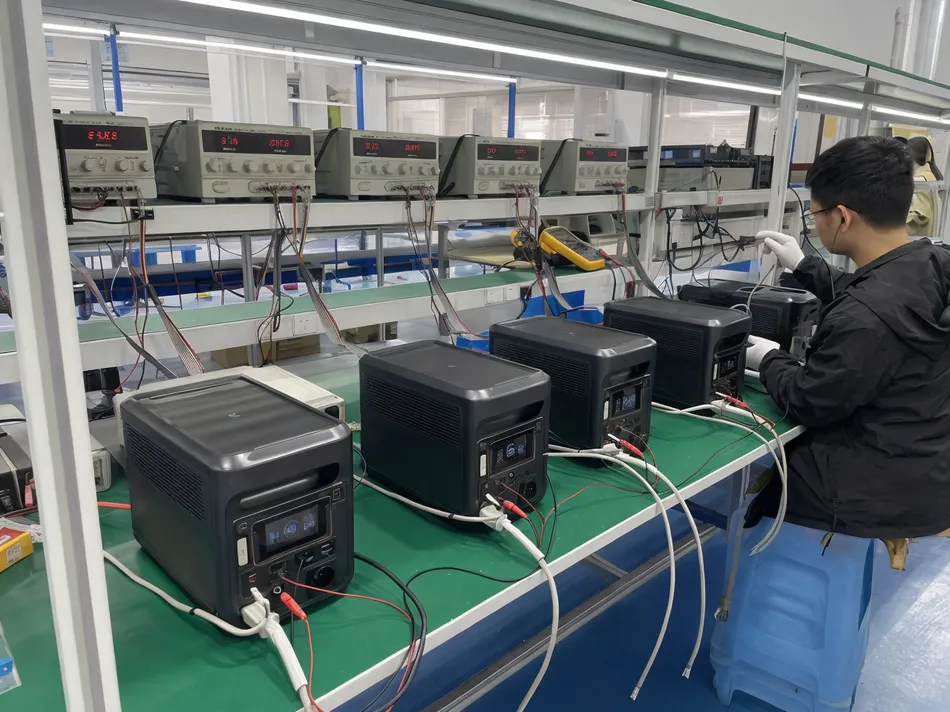 Battery pack aging test station with voltage and temperature monitoring equipment at JXSOL factory