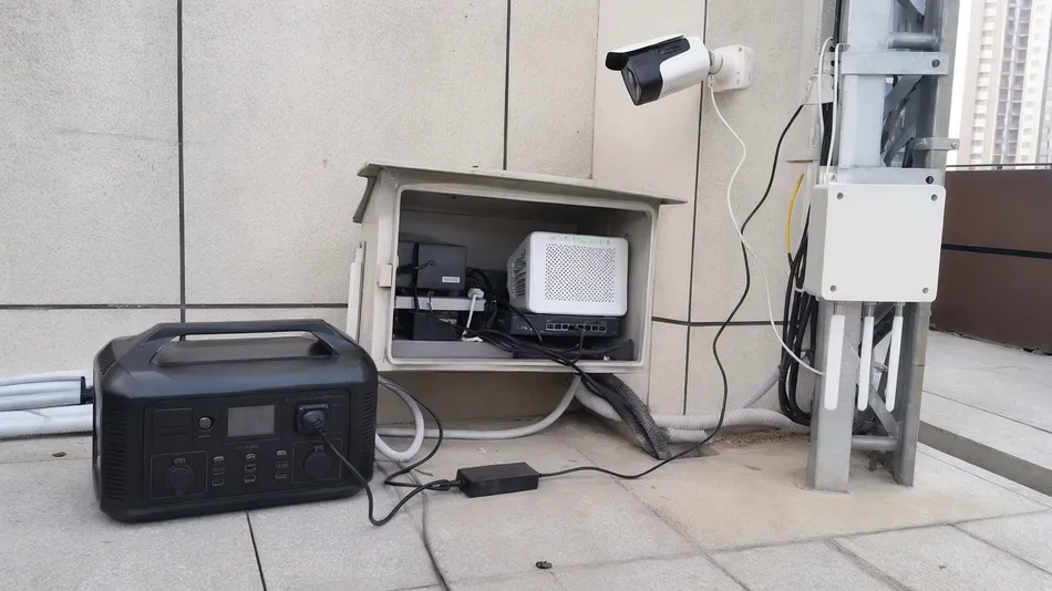 Portable power station backing up security cameras and telecom equipment at installation site