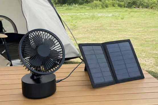 Compact portable solar fan for outdoor and camping use