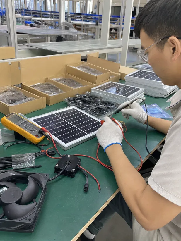 Solar panel electrical output testing at JXSOL factory