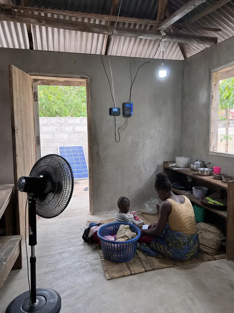 Solar fan with LED light kit deployed in off-grid rural household setting