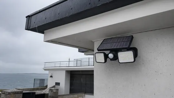 IP67 waterproof solar security light installed on a coastal property exposed to salt air and wind-driven rain