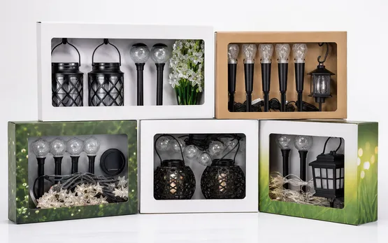 Mixed decorative solar garden light sets combining multiple styles in retail packaging