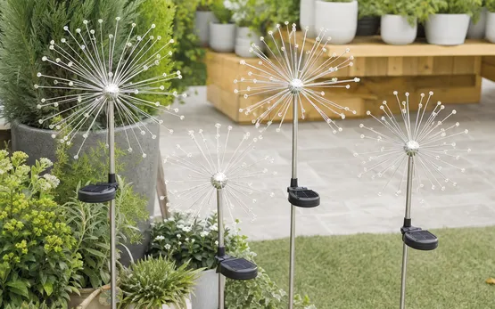 Solar dandelion lights with radiating wire stems and LED tips in sphere burst form