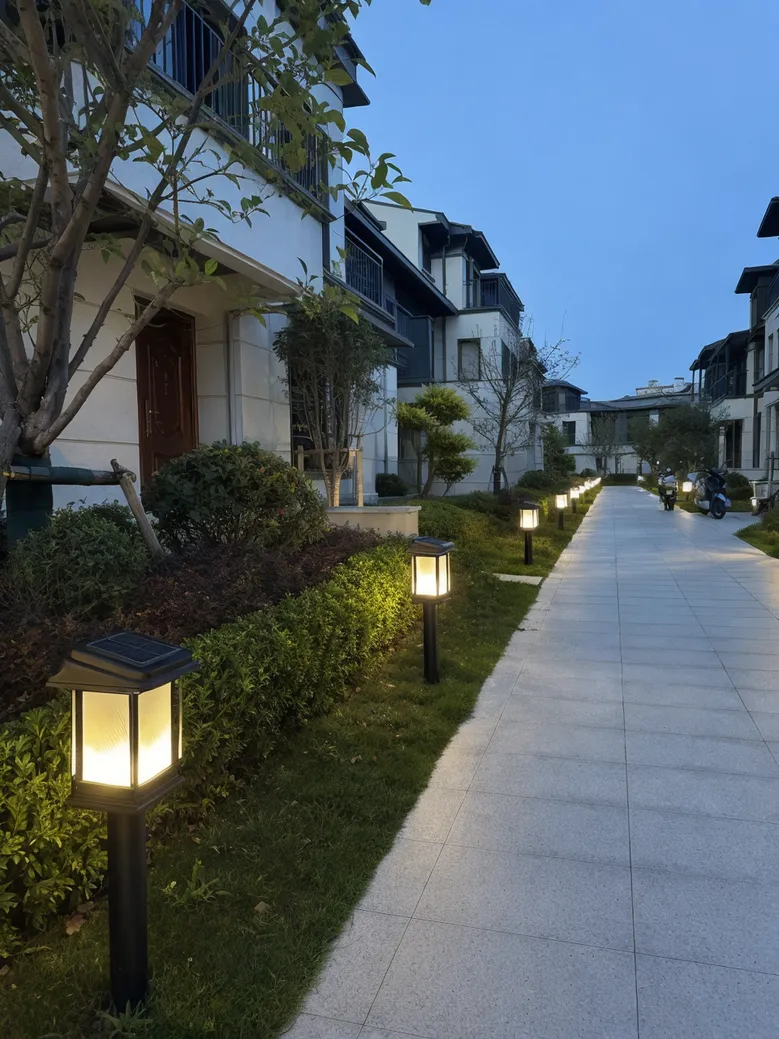 Solar garden lights installed uniformly across a residential villa development project