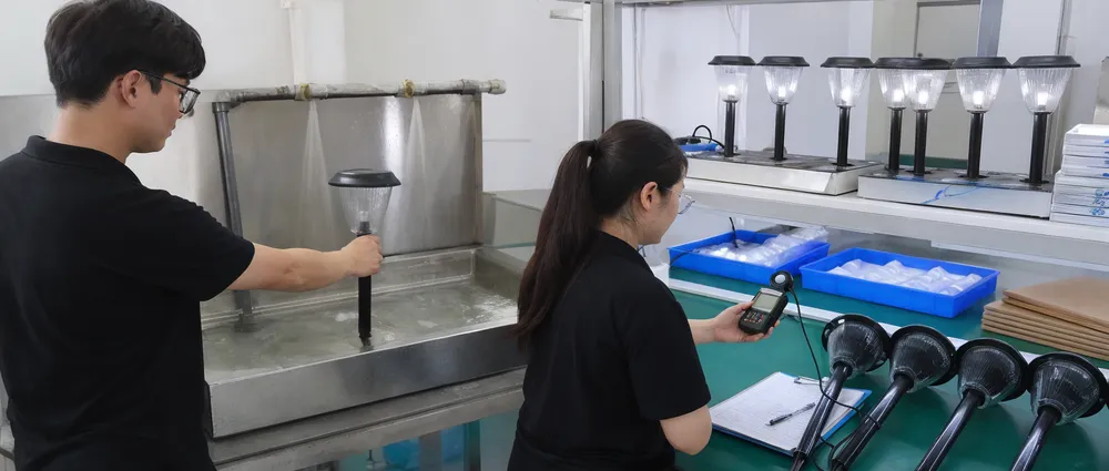 Quality assurance testing of solar garden lights including waterproof testing and lumen measurement