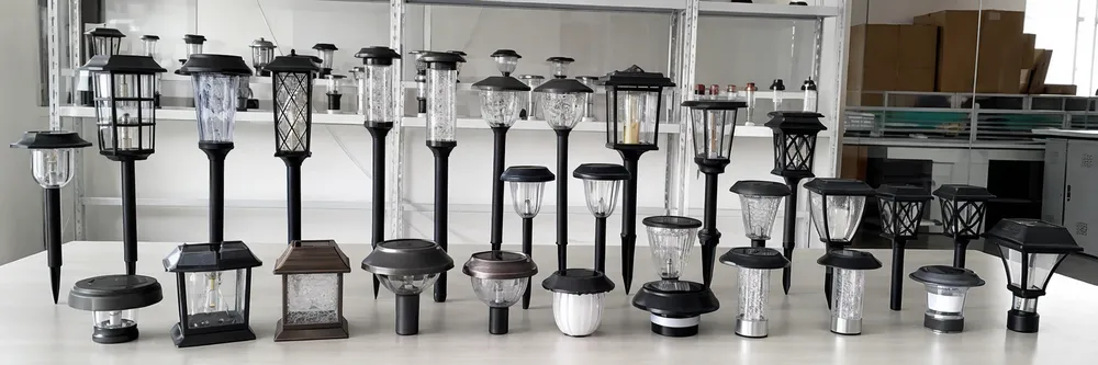 Range of solar garden light SKUs including stake lights, lawn border lights, and patio accent lights for channel distribution