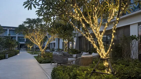Solar tree lights installed in a hotel courtyard garden