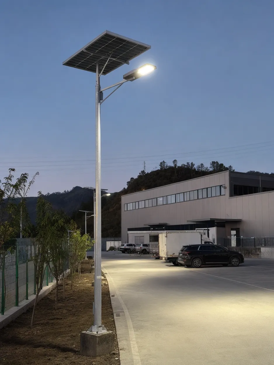 JXSOL solar area light pole-mounted fixture illuminating an outdoor commercial zone at dusk