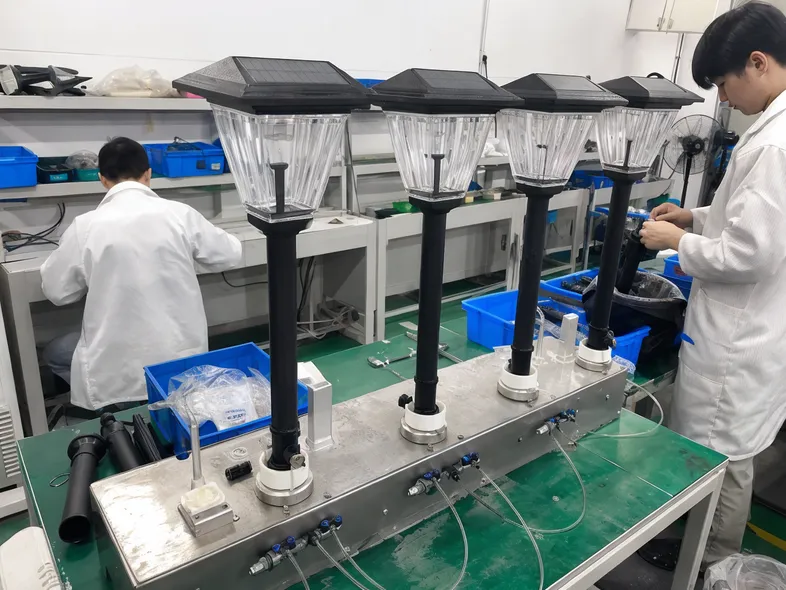 Dedicated waterproof inspection equipment testing assembled solar pathway light units at JXSOL factory