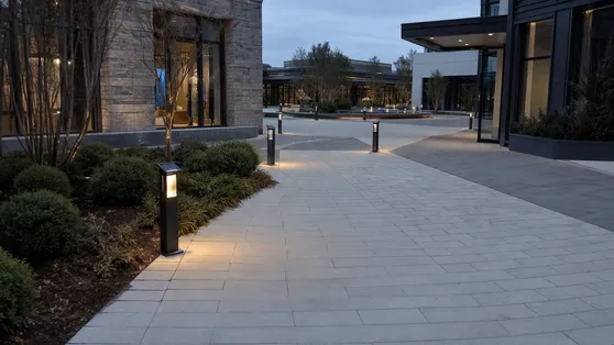 Solar bollard lights defining a retail center courtyard entrance