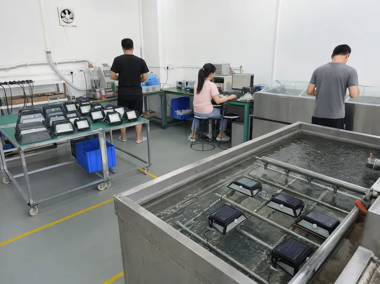 In-house IP waterproof testing and LED binning equipment at JXSOL solar deck light production facility