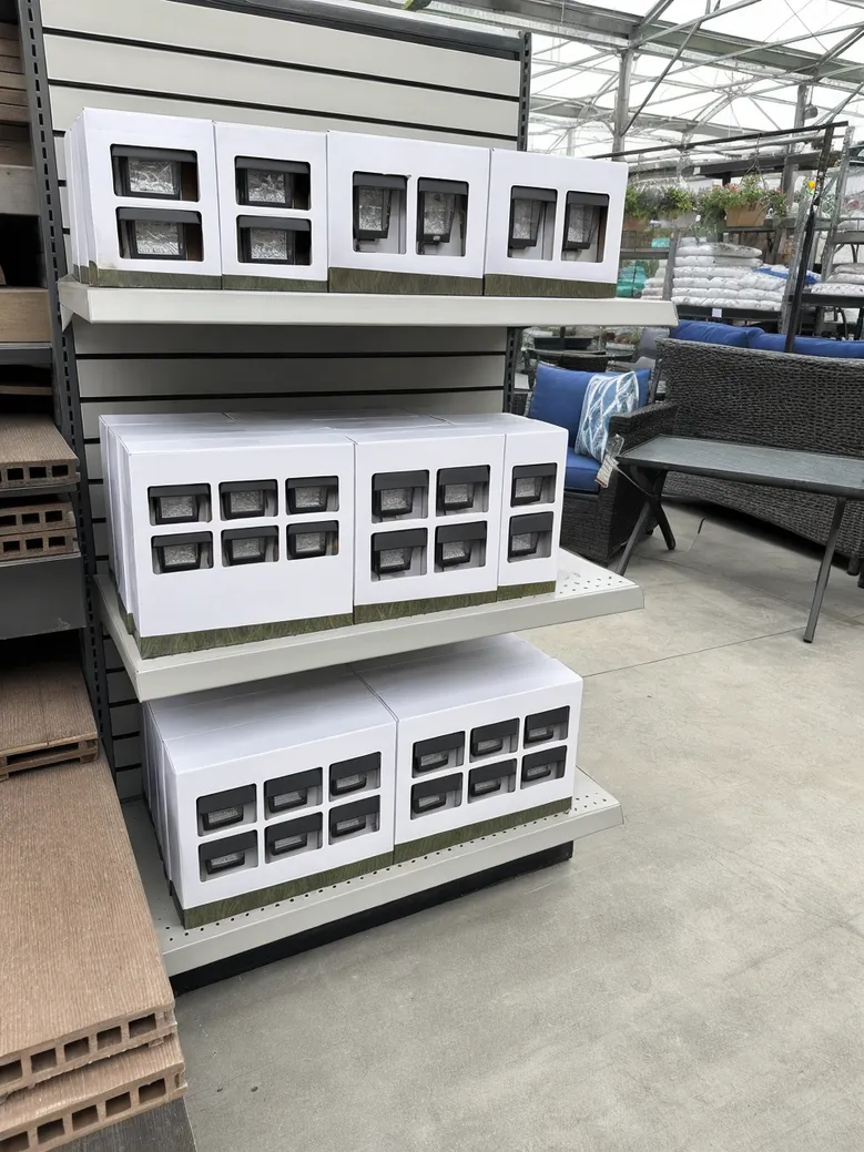 Solar deck light multi-pack display in a garden center retail environment