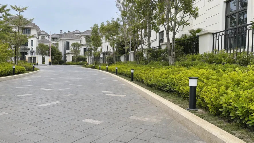 Post-style solar driveway light, 30-60cm height, installed along a villa entrance lane