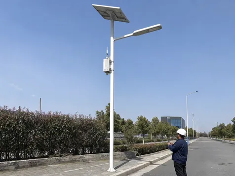 Smart solar street light with remote monitoring and dimming schedule capabilities