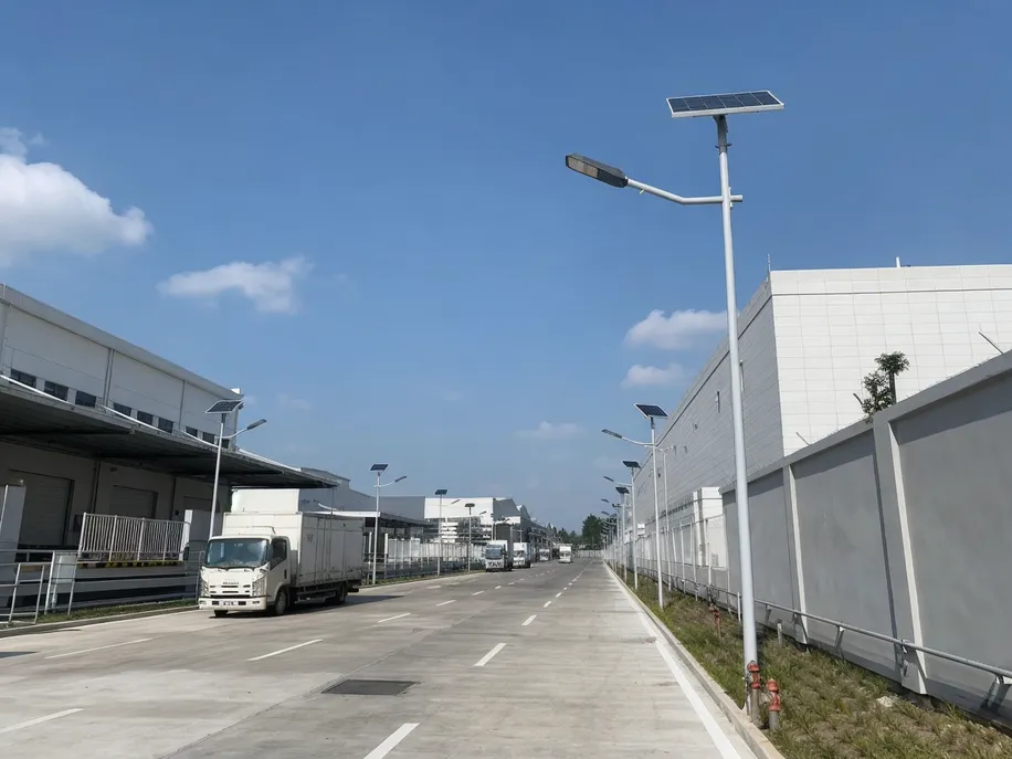 Smart solar street lights installed along logistics roads in an industrial park facility