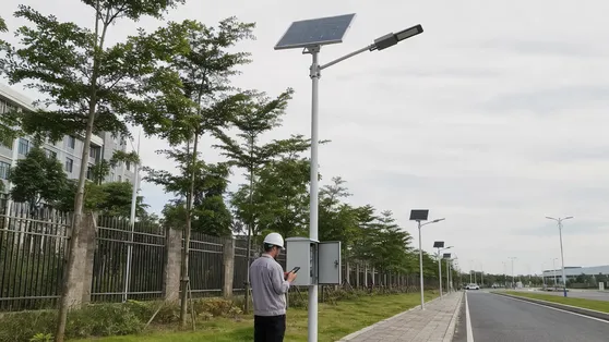 Smart solar road light with remote monitoring and programmable dimming for municipal road networks