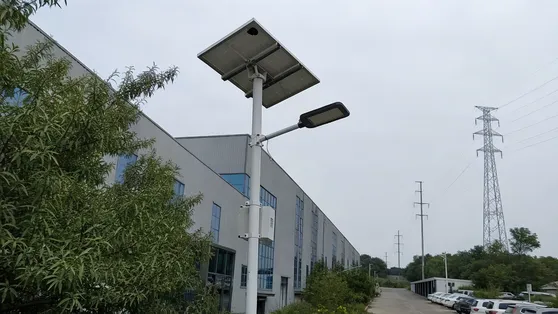 Split solar road light with separate panel mounted above the fixture for higher latitude installations