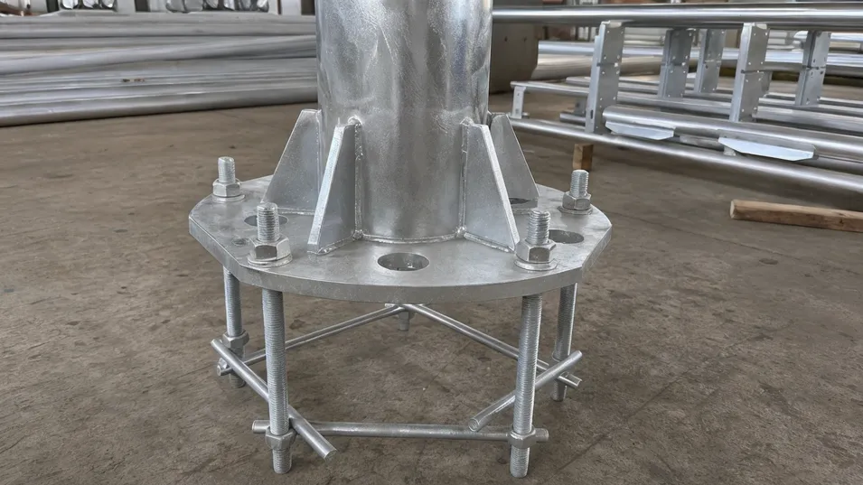 Close-up of hot-dip galvanized flange base plate with anchor bolt cage for solar street lighting pole