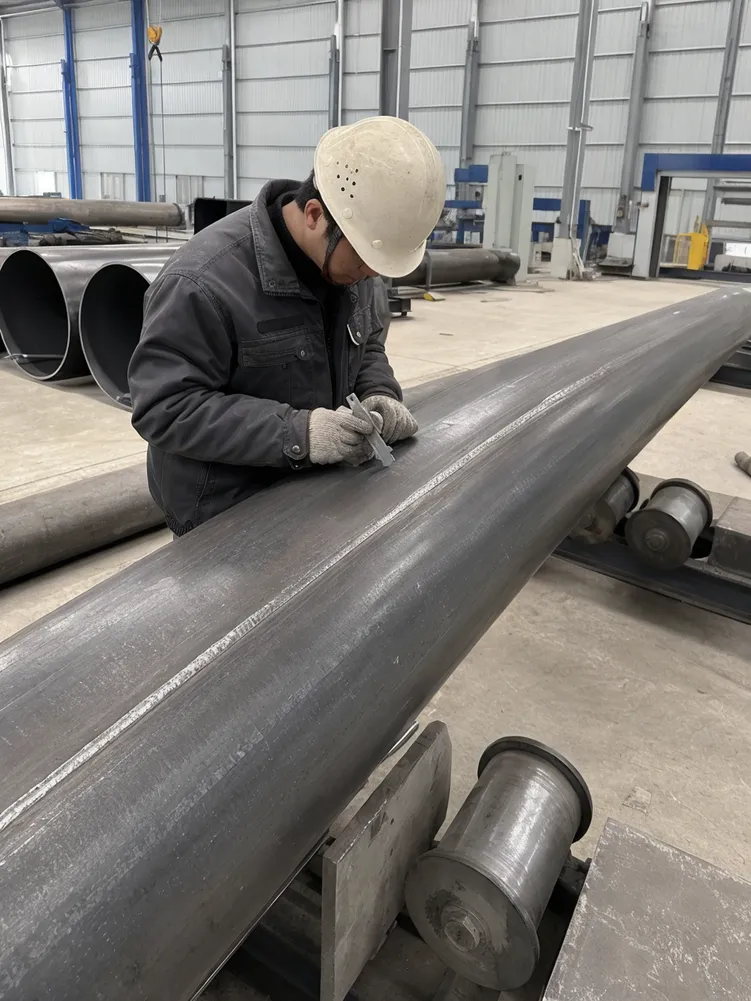 CNC-rolled steel pole shaft with full-penetration weld seam inspection