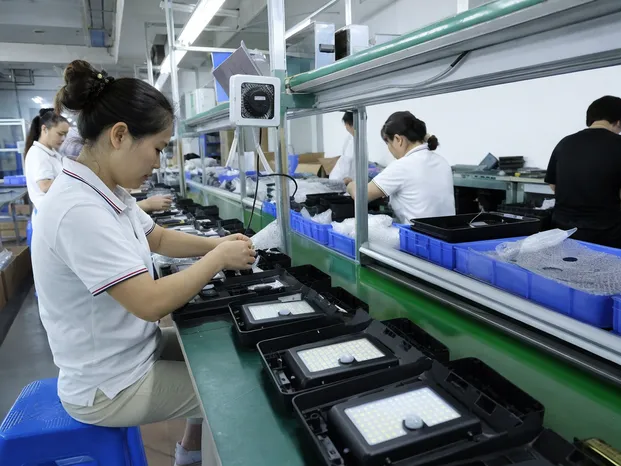 JXSOL factory production line assembling integrated solar wall lights