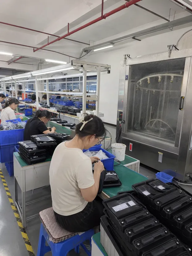 JXSOL factory production line for waterproof solar wall lights with IP testing equipment