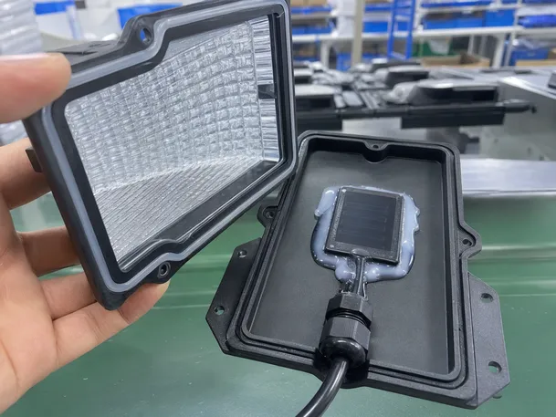 Close-up of IP67 sealed housing showing lens gasket and cable gland